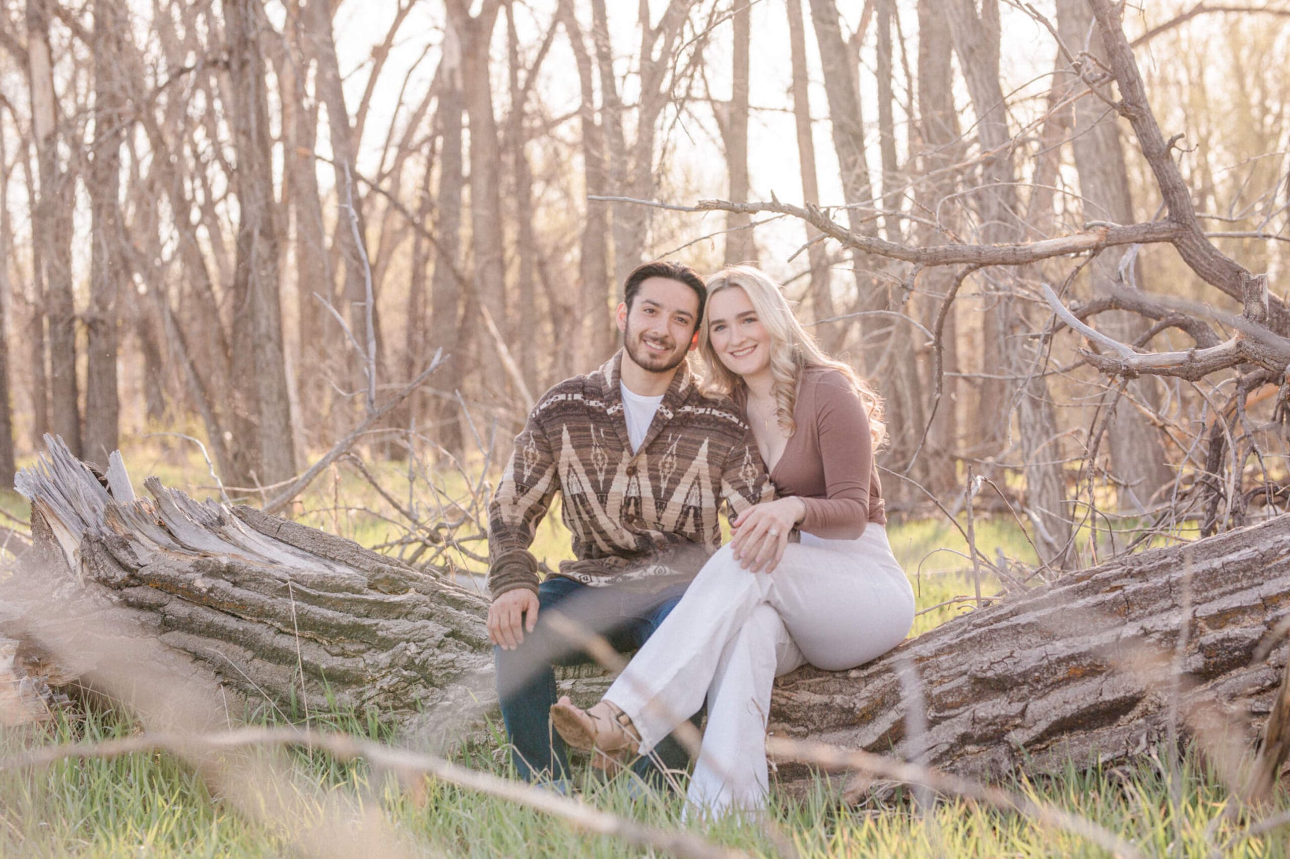 Couple smiling for their Colorado Engagement Photos at Walden Ponds in Boulder, Co