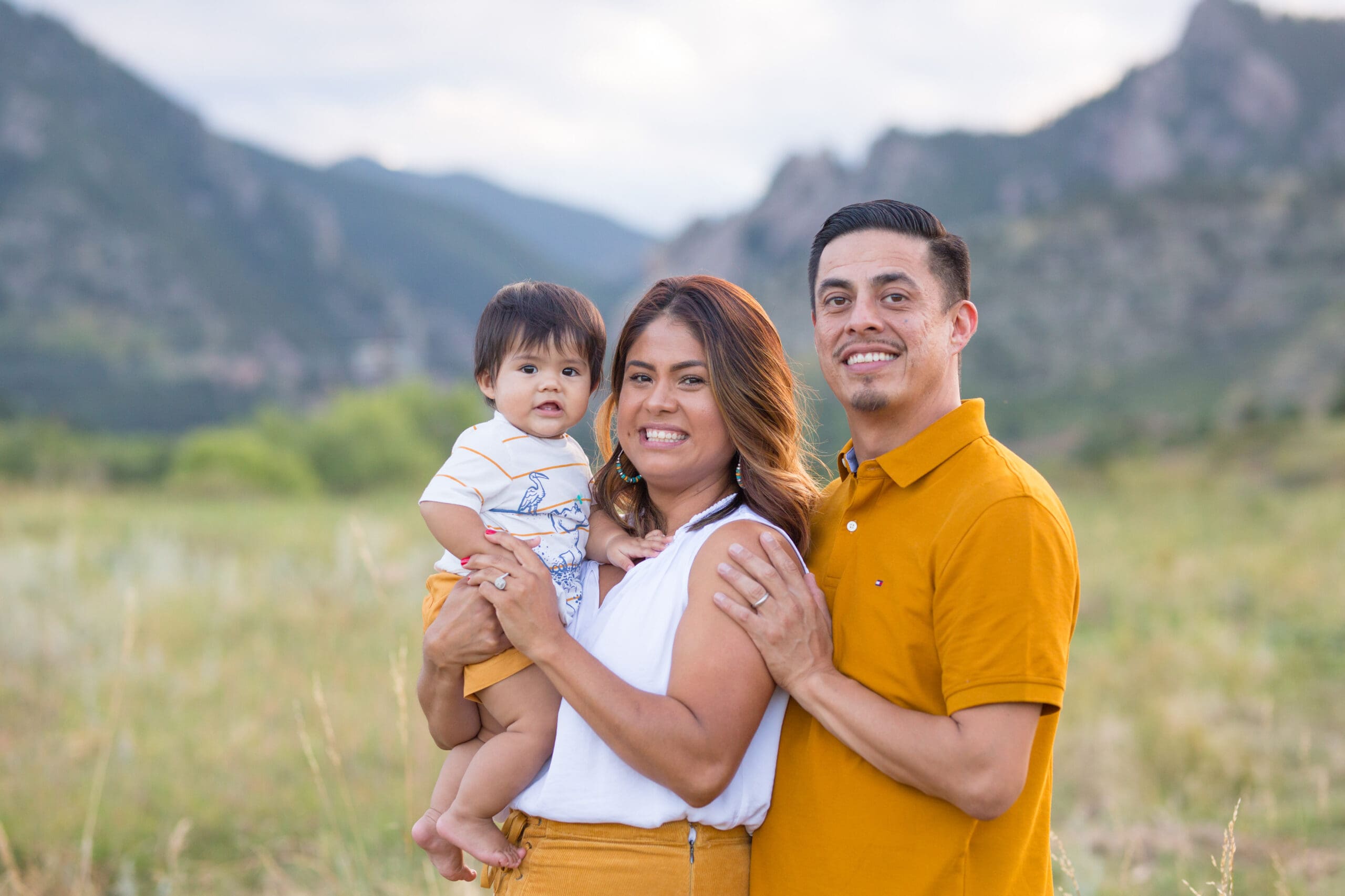 A family smile during their Colorado Engagement Photos at South Mesa Trailhead in Boulder