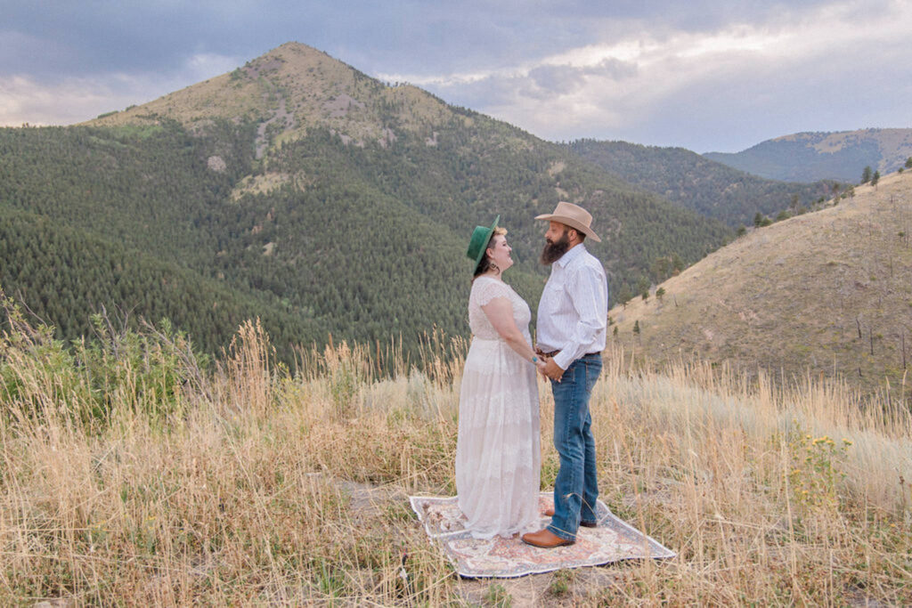 A couple gaze at each other lovingly during their Colorado elopement photos