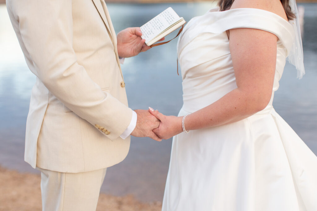 A couple exchange vows during their Boulder elopement at Wonderland Lake