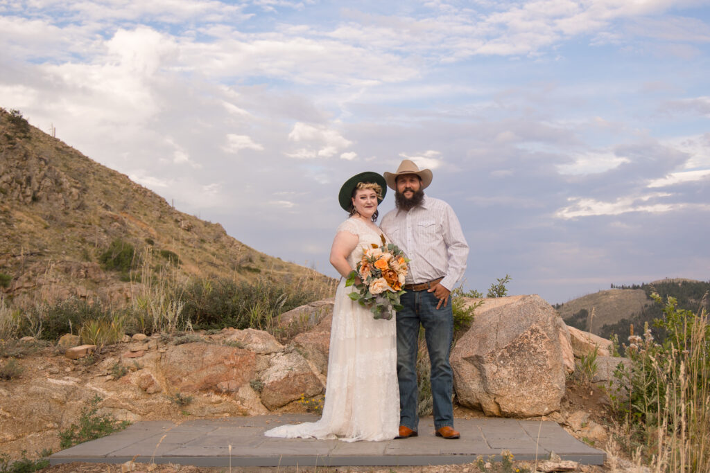 A couple smile during the elopement at an airbnb near Betasso Preserve