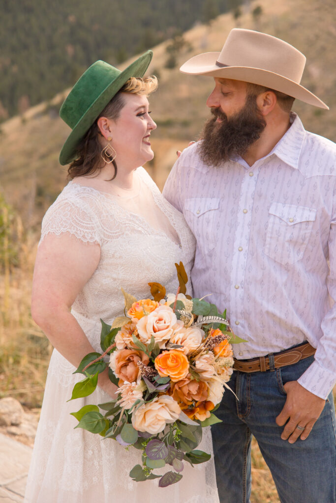 A couple exchange a loving glance during the Boulder elopement