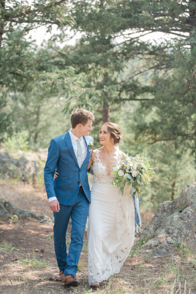 A couple talk together, enjoying a quiet moment before their wedding celebration