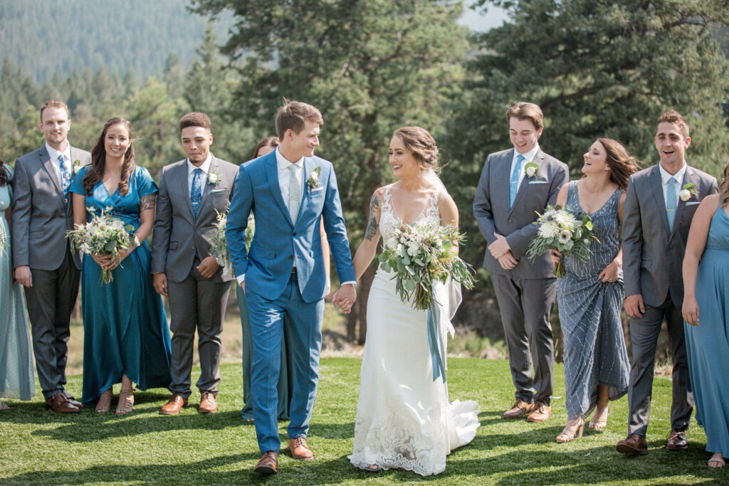 Wedding Party looks on while the newly married couple walk to their venue, The Woodlands Colorado