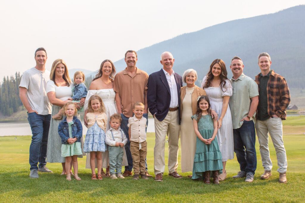 Family celebrating a 45th anniversary at Keystone Ranch wedding venue in Colorado with children and grandchildren